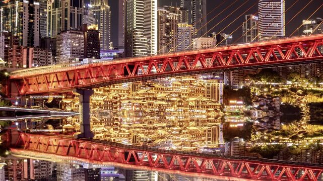 Chongqing cyberpunk city skyline illuminated at night reflected in water
