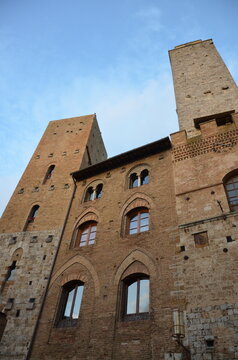 San Gimignano, Italy 03.04.2020: Town Hall (also known as the Palazzo del Popolo or Palazzo Nuovo del Podest&agrave;) and the Torre Grossa in San Gimignano