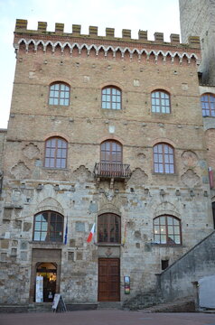 San Gimignano, Italy 03.04.2020: Town Hall (also known as the Palazzo del Popolo or Palazzo Nuovo del Podest&agrave;) and the Torre Grossa in San Gimignano