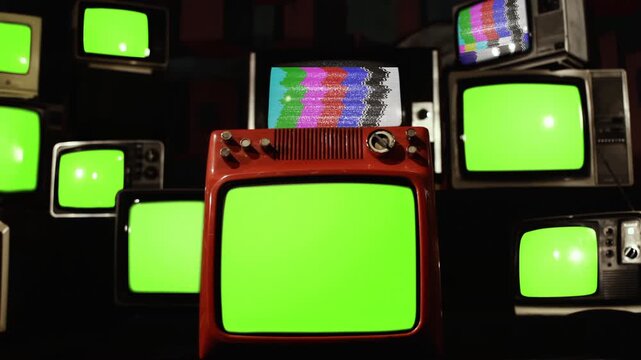 Stacked Retro TVs Turning On With Static Noise To Green Screens - 4K