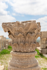 Obraz premium Corinthian Capital on Its Base in the Palace of Gordian, Volubilis, Morocco
