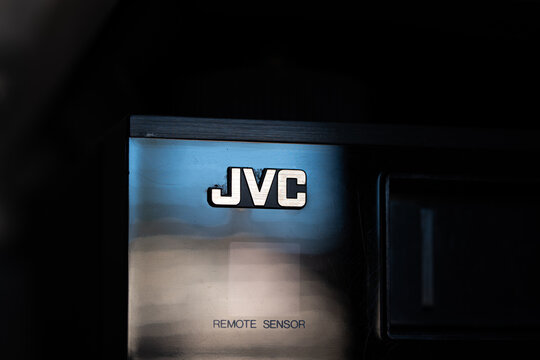Urdorf, Switzerland - July 10, 2026. Close up of the vintage jvc brand logo on a black electronic audio receiver