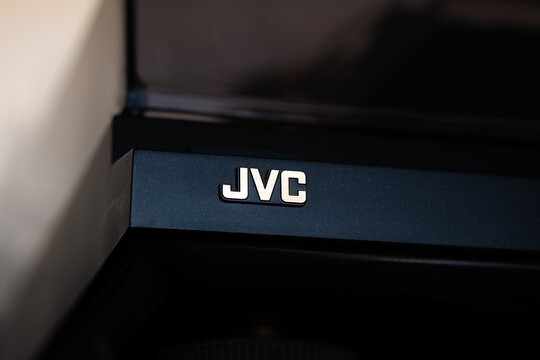 Urdorf, Switzerland - July 10, 2026. Close up of the vintage jvc brand logo on a black electronic audio receiver