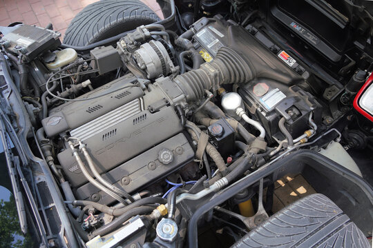 Chevrolet Corvette C4 LT1 V8 Engine - high angle close up shot of a powerful 5.7L small block motor inside the open hood of a vintage american sports car in Palic, Serbia on July 5, 2026