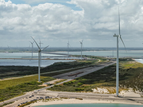 Oosterscheldekering, a large storm surge barrier and flood defense system, integrating wind turbines for sustainable power generation