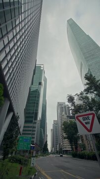 Modern cityscape of Singapore City featuring glass skyscrapers in the financial business district with vibrant streets contemporary architecture and tourism in Asia
