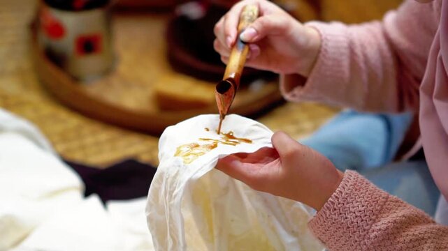 The batik making process. A type of handmade fabric from Indonesia.