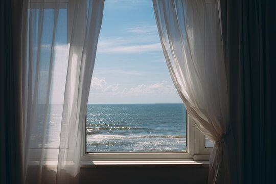 Ocean view through an open window with flowing curtains in a peaceful summer vacation setting