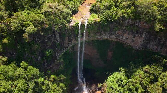 Breathtaking footage of Chamarel Waterfall Mauritius Surrounded by Lush Greenery