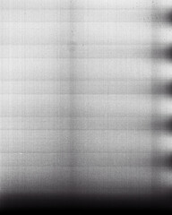 Fototapeta na wymiar Blank grained film strip texture background with heavy grain, dust and light leak
