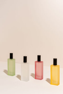 Colorful minimalist perfume bottles displayed