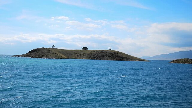 The highland lake scenery of San Tai Island in Sayram Lake, Bortala Mongol Autonomous Prefecture, Xinjiang, China