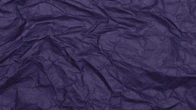 Crumpled Sheet of Dark Blue Paper Background Texture. Loopable Stop Motion Animation