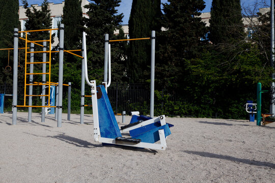 public outdoor fitness equipment in open air gym for community exercise and healthy lifestyle showing modern sports infrastructure concept of fitness wellness recreation and urban development