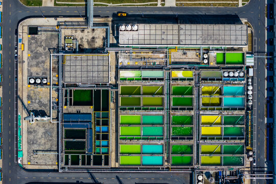 wastewater treatment plant with colorful tanks