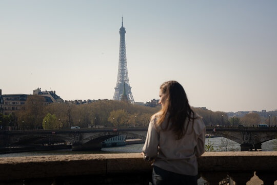 Woman enjoying panoramic Eiffel Tower view