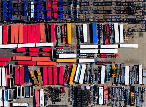 colorful semi-finished containers in factory yard
