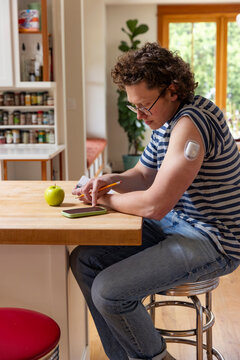Smartphone App continuous glucose monitor Portrait man data