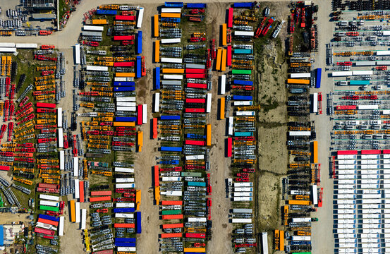 colorful semi-finished containers in factory yard