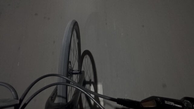 Bicycle Wheel and Shadow on Wall