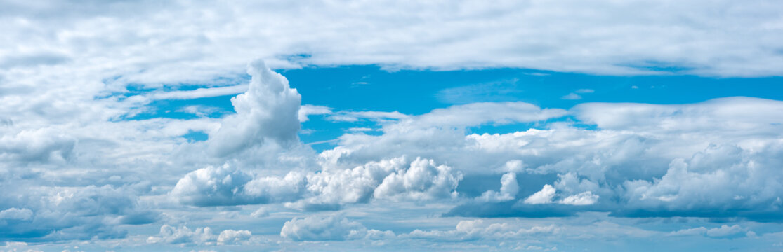 Panoramic blue sky with stormy clouds
