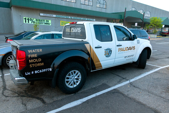 Working Paul Davis emergency truck shopping for supplies at Menards for home repair. St Paul Minnesota MN USA