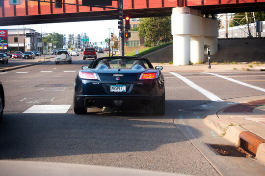 Saturn Sky two-door roadster with designer license plate "MRSPEEL" which may refer to an early TV show. St Paul Minnesota MN USA