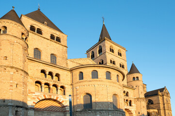 Fototapeta premium High Cathedral of Saint Peter in Trier, Moselle Valley Germany, roman catholic dom, brickwork tower facade 