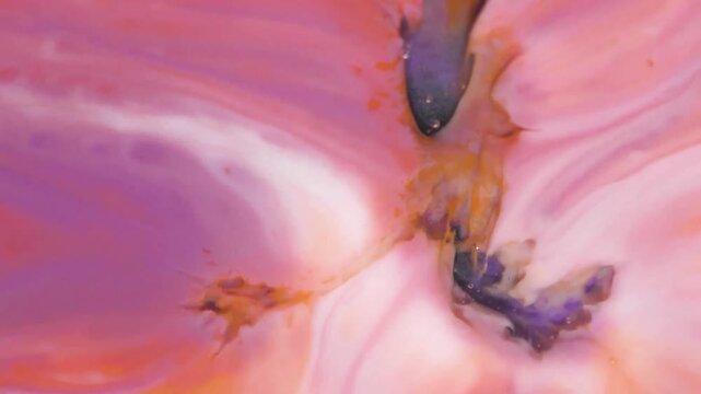 Pink watercolor blending soft pastel pigments into elegant abstract composition