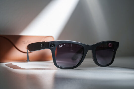 Dusseldorf, Germany - July 9 2026: Ray-Ban Meta smart glasses with sleek black frame displayed on white sunny background