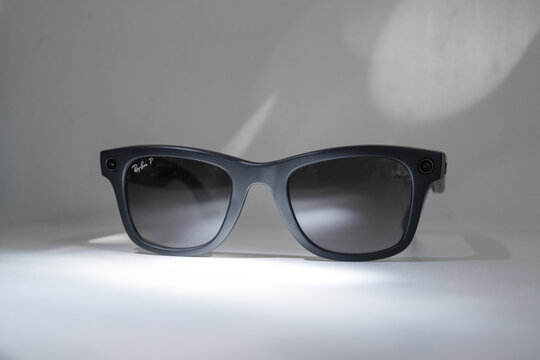 Dusseldorf, Germany - July 9 2026: Ray-Ban Meta smart glasses with sleek black frame displayed on white sunny background