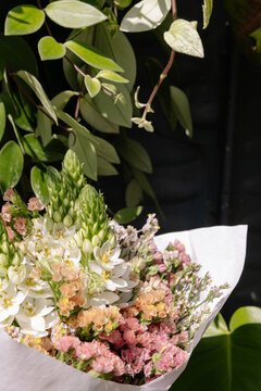 curated bouquets of flowers displayed in a hip van at a stylish street fair