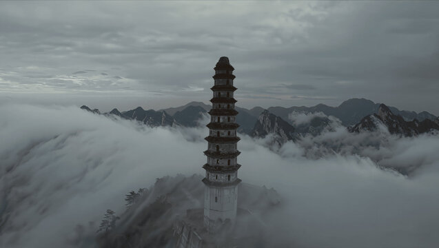 Lonely pagoda emerging from dense mountain fog, desaturated colors, cinematic photography