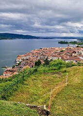Naklejka premium Top view from of the maggiore lake from the hill in arona, italy