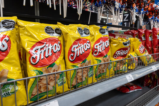 Bags of Fritos chips by Sabritas, owned by PepsiCo, on supermarket shelves for retail sale. Jalisco, Mexico, July 20, 2026. Lays