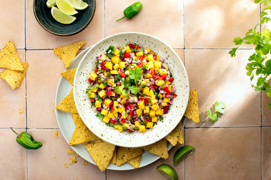 Fresh spicy mango Salsa with habanero and red onion