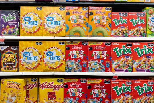 Boxes of Froot Loops, Trix, and Corn Pops cereal, by WK Kellogg Co and General Mills, on shelves. Jalisco, Mexico, July 20, 2026.