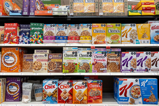 Boxes of Kellogg's, Extra, and Cheerios cereal, by WK Kellogg Co and General Mills, on supermarket shelves. Jalisco, Mexico, July 20, 2026. Zucaritas