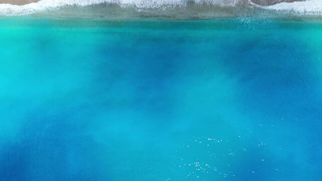 Top Down Drone View of Turquoise Waves and Sandy Beach, Lefkada Island, Greece