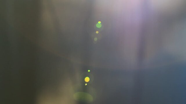 sun glare on a blurred background