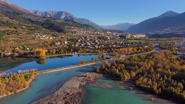 Aerial view of Embrun and Serre-Poncon Lake with the Durance River in autumn. Scenic alpine landscape in the Hautes-Alpes region of the French Alps. France