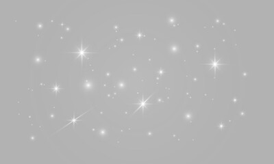 Fototapeta premium Sparkling white glittering twinkling stars burst and glowing light particles overlay for dark night sky fantasy background and Christmas, snow, winter, Xmas effect on transparent PNG