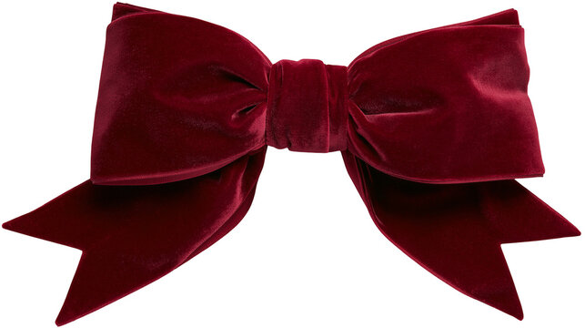 Luxurious deep red velvet bow with wide loops and pointed ends, isolated on transparent background