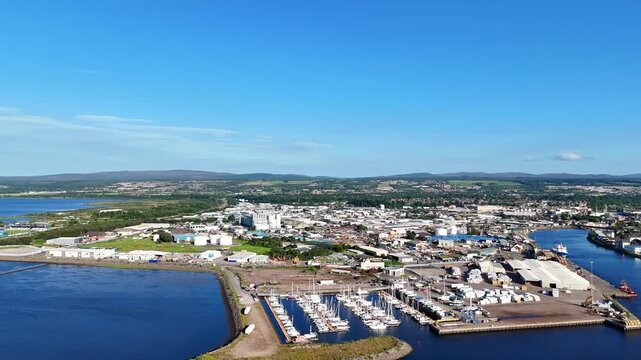 Scenic aerial panorama of Inverness Highlands coastline and Beauly Firth canal lock