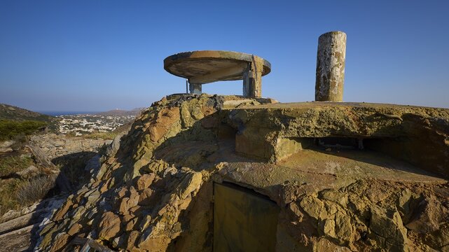 An old, dilapidated concrete building on a hill with a sea backdrop, Lost Place, Lago anti-aircraft battery, bunker, Apitiki Mountain, Leros, Dodecanese, Greek Islands, Greece