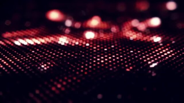 Abstract red digital motion background with glowing dot matrix pattern