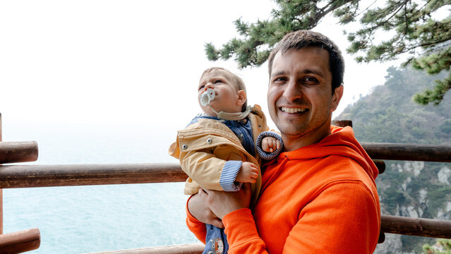 Father and child on Igidae Coastal Trail