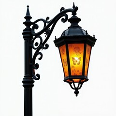 Obraz premium Old black street lamp with ornate details and warm orange glass panes featuring butterfly and floral etchings. Provides soft, inviting illumination for outdoor ambiance.