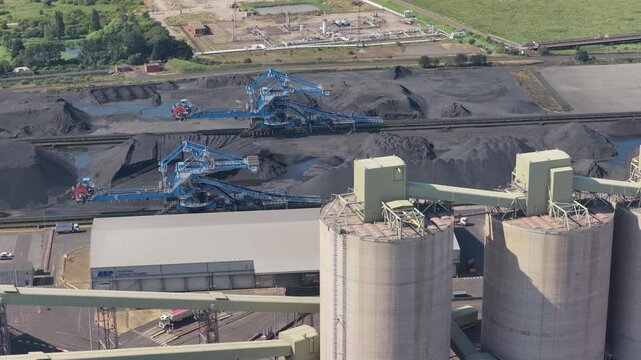 Industrial Coal Processing Facility With Stacker Reclaimers Operating During Day