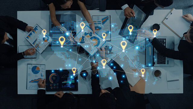 Concept of a global logistics network with location pins on a world map. This represents an international supply chain and distributed business locations for worldwide reach. Fermion